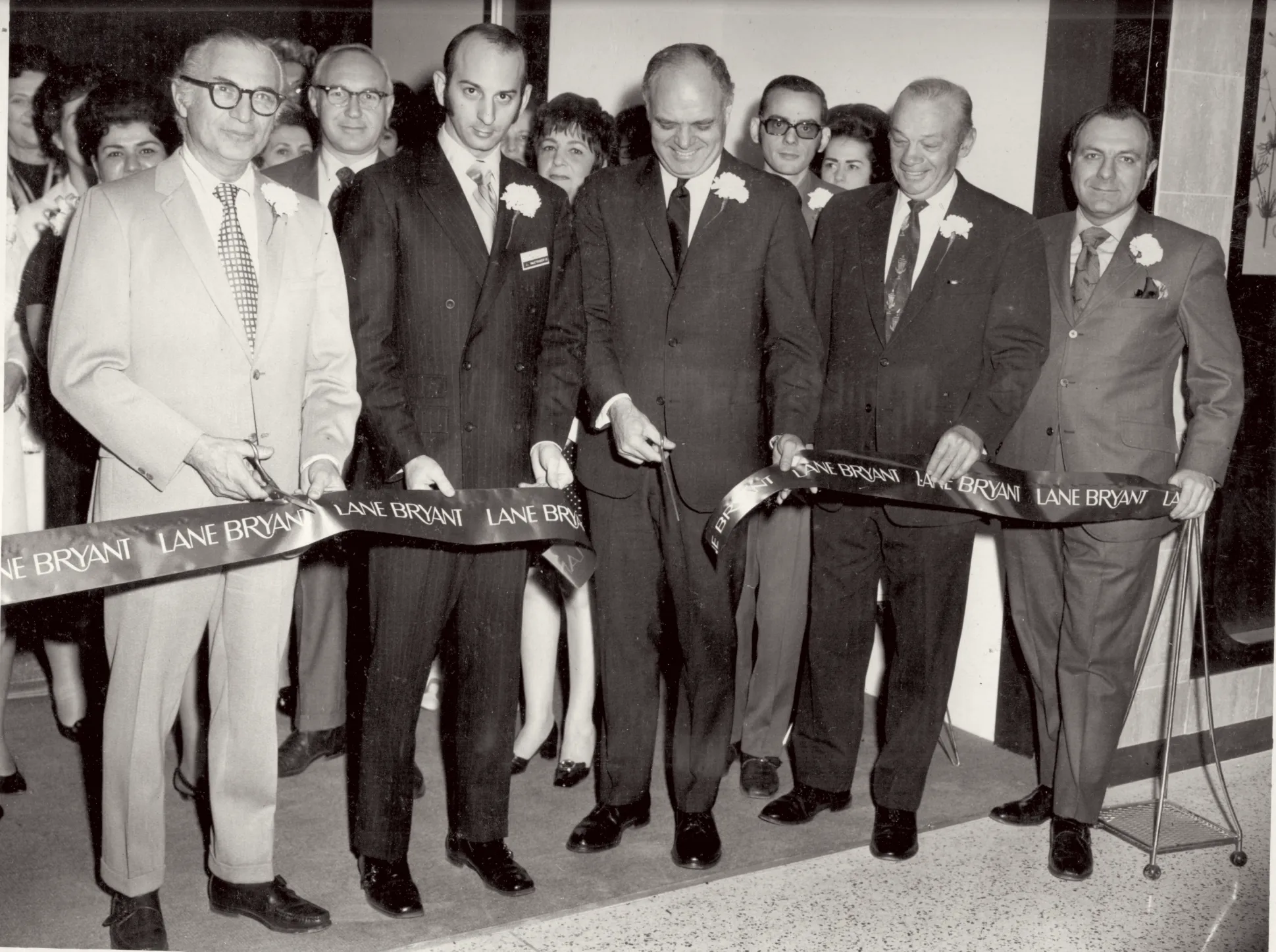 Crowds at the opening of a Lane Bryant store, mid-century.